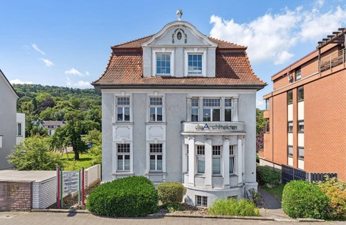 Hamelin Apartment | Charysma: Art nouveau meets modernity | darts | table football | car park