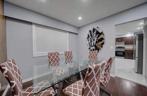 Delta House | Cheerful 3 bdrm home w/Parking and large backyard