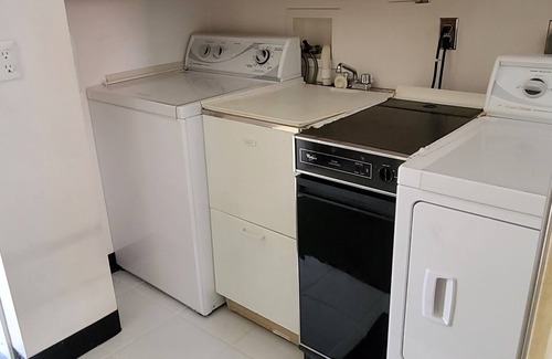 Amherst House | Cheerful 4-bedroom bungalow with indoor fireplace.