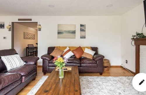 Russell House | Cheerful 4 bedroom home with fireplace!
