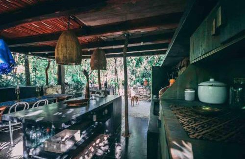 Francisco Uh May Apartment | Cheerful cabin with pool surrounded by nature