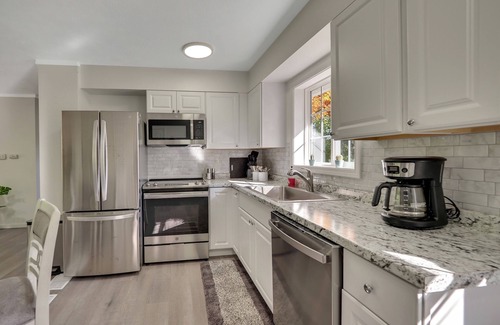 Rapid City Cottage | Cheerful Cottage in Elk Rapids - just steps from the lake!