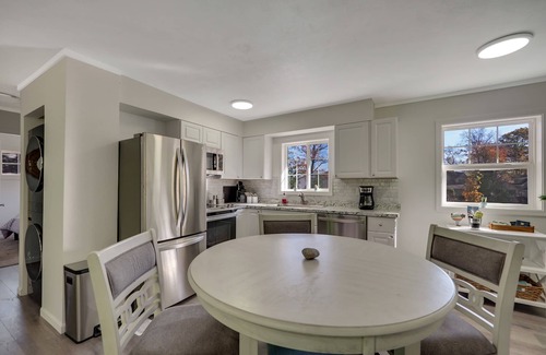 Rapid City Cottage | Cheerful Cottage in Elk Rapids - just steps from the lake!