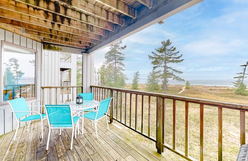 Glen Arbor Condo | Cheery beachfront condo in Glen Arbor's Homestead Resort with deck & fireplace