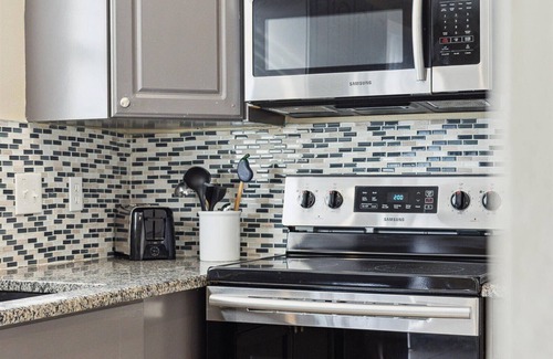 Cape Caneveral Beach Gardens House | Cherie Down Townhome W/Patio, Balcony, BBQ Grills, Fire Pit & 5 Minute Walk to the Beach! 🏖️