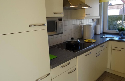 Horum House | Chic and idyllic location: The terraced house with its approx. 70 square meters is modern