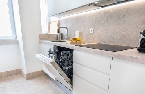 Bairro Alto Apartment | Chic, Citrus Home with a Private Garden by LovelyStay