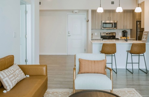 Miami Gardens Condo | Chic, dog-friendly condo with tropical pool, fitness center & great location