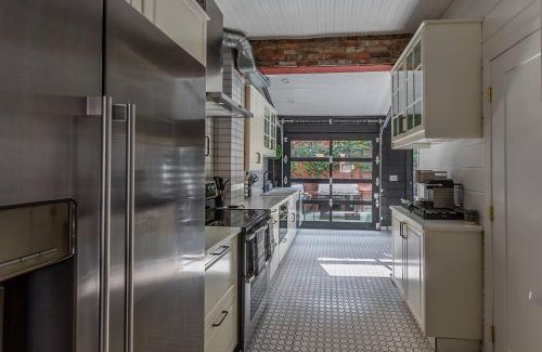 South Side Flats House | Chic Home with King Bed and Fire Pit