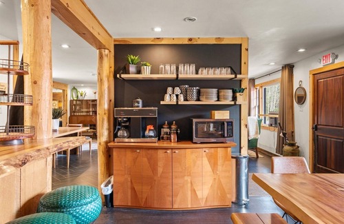 Hancock Hotel | Chic Modern Farmhouse Retreat Featuring a Peaceful Garden Gazebo and Fire Pit View