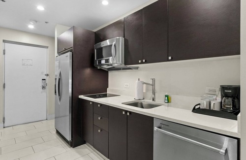 Ludlam Hotel | Chic Modern Stay Near Miami Airport | Kitchen, Outdoor Pool, Onsite Restaurant