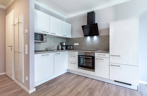 Alt-Travemunde/Ronnau Apartment | Chic, modern vacation apartment with loggia and use of the SPA included -