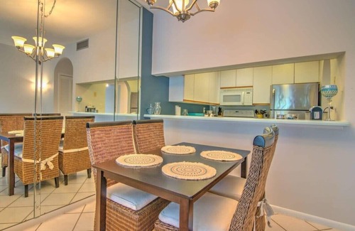 Central Naples Condo | Chic Naples Getaway - Tennis, Pool, Comfort!