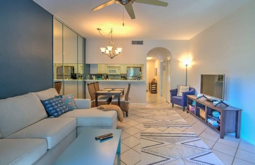 Central Naples Condo | Chic Naples Getaway - Tennis, Pool, Comfort!