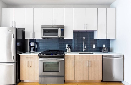 D Street - West Broadway Apartment | Chic South Boston studio w/Gym, W/D by Seaport & Lawn on D by Blueground