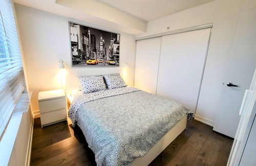 Wallace Emerson Condo | Chic Toronto Apartment With Balcony, Parking & Gym