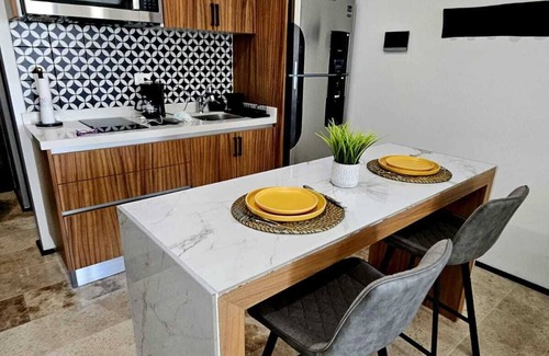 Tohoku Apartment | Chic Upper-Floor Condo with Rooftop Ocean Views Steps from Mamitas Beach 5th Ave
