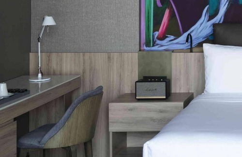 Hipodromo Hotel | City Chic: Stay in Style with On-Site Dining and Fitness Facilities!