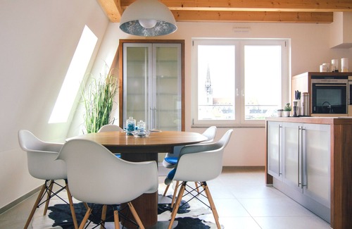 City Centre Regensburg Apartment | City tower above the rooftops of Regensburg