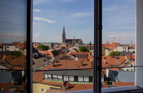 City Centre Regensburg Apartment | City tower above the rooftops of Regensburg