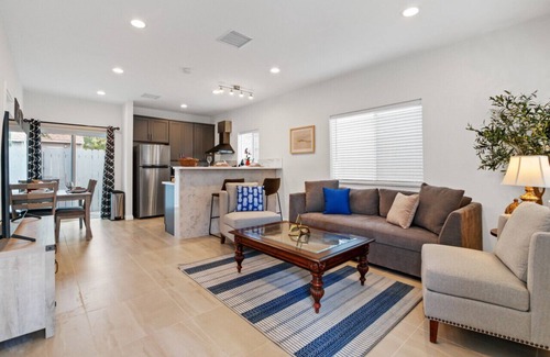 Covina House | City Vista Hideaway: Spacious 2-story back house. Relax with a 65” Smart TV, Unwind on the Balcony,