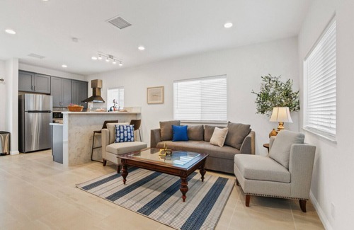 Covina House | City Vista Hideaway: Spacious 2-story back house. Relax with a 65” Smart TV, Unwind on the Balcony,