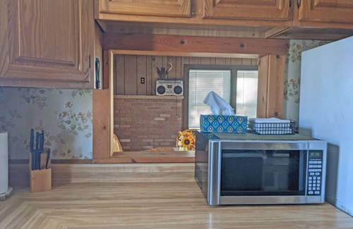 Tawas City House | Classic and Affordable Lake Home, WWII Display, Canoe, Deck, Quiet Neighborhood