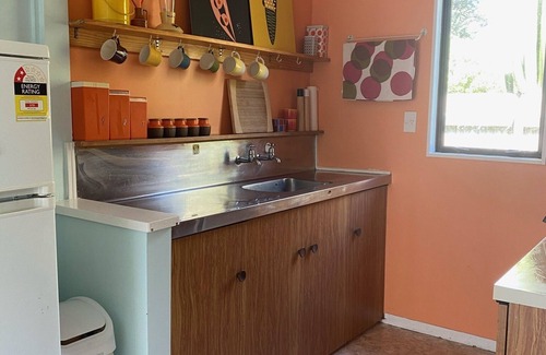 Waitarere Beach House | Classic bach just across the road from the Beach!