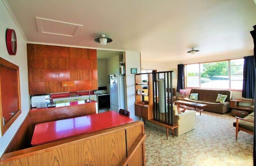 Wharewaka House | Classic holiday spot, memories at Wharewaka Beach
