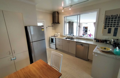 Otaki House | Classic Kiwi Bach at Otaki Beach. Pet and Family Friendly!