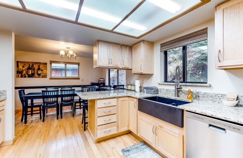 Joseph House | Classic lakefront home with private hot tub, fireplace & washer/dryer
