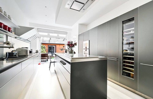 Earl's Court Apartment | Classic London: Three bedroom Family Home with Private Garden Space.