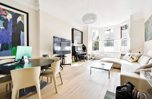 Earl's Court Apartment | Classic London: Three bedroom Family Home with Private Garden Space.