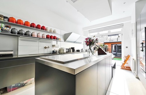 Earl's Court Apartment | Classic London: Three bedroom Family Home with Private Garden Space.
