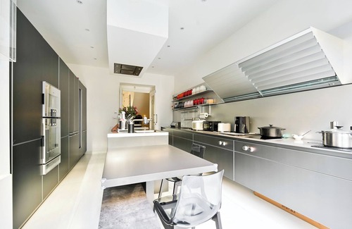 Earl's Court Apartment | Classic London: Three bedroom Family Home with Private Garden Space.