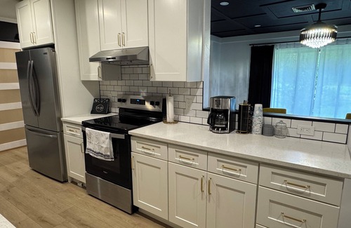 Coleman House | Classic Mid Century Home with Fenced Yard near The Village’s