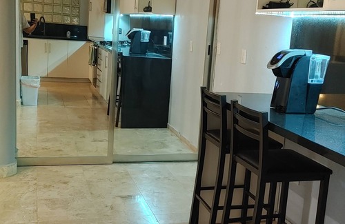 Alfredo V. Bonfil House | Close to airport, 7 km ~20 mins. Open concept main, modern kitchen, pool palapas