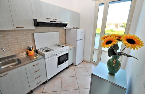 Torre Suda Apartment | Coastal Comfort in Torre Suda