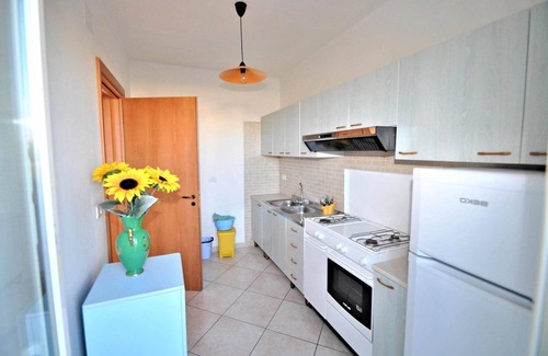 Torre Suda Apartment | Coastal Comfort in Torre Suda