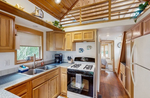 Brookings Condo | Coastal condo with stunning views, a cozy loft, private deck and hot tub