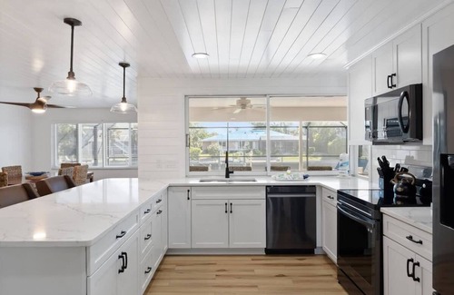 Shell Harbor House | Coastal Cottage on Canal, East End with Pool