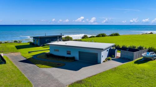 Warea House | Coastal Daze - New Plymouth Holiday Home