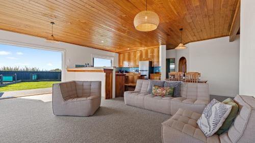 Warea House | Coastal Daze - New Plymouth Holiday Home