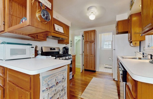 Pocasset House | Coastal dog-friendly cottage near Hen Cove with sunroom, beach access, & games