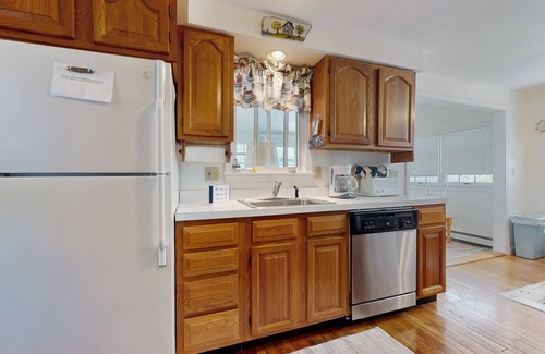 Pocasset House | Coastal dog-friendly cottage near Hen Cove with sunroom, beach access, & games