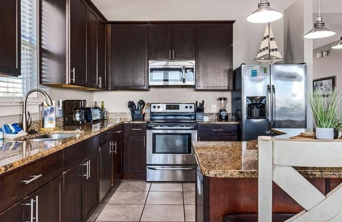 Morgantown House | Coastal Haven Your Fort Morgan Retreat Neighborhood pools and tennis by Prickett Properties