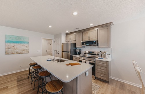 Sea Trail Condo | Coastal resort condo with on-site pools, hot tub, game room, & golf