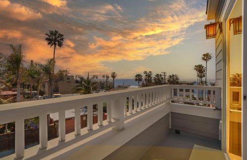 Beach Barber Tract House | Coastal retreat near the beach w Panoramic Ocean Views, Rooftop Deck, & Firepit