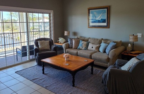 St. James Condo | Coastal Retreat - Relaxing Marina View - Minutes from Oak Island