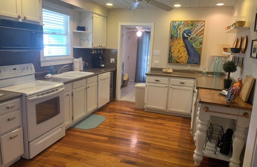 Waveland House | Coastal Serenity - Old time charm with a coastal touch near the beach.